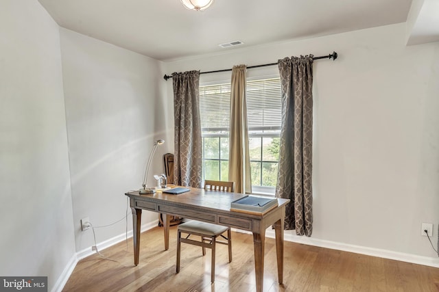 home office featuring hardwood / wood-style flooring