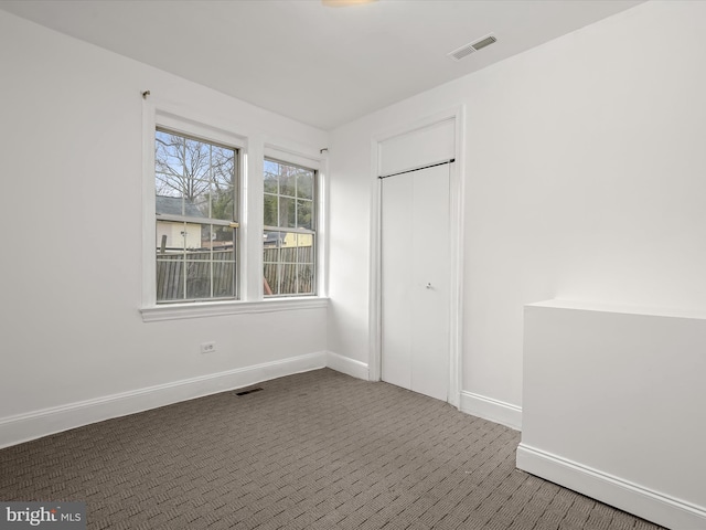 unfurnished bedroom featuring carpet flooring