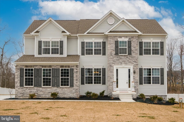 view of front facade featuring a front yard