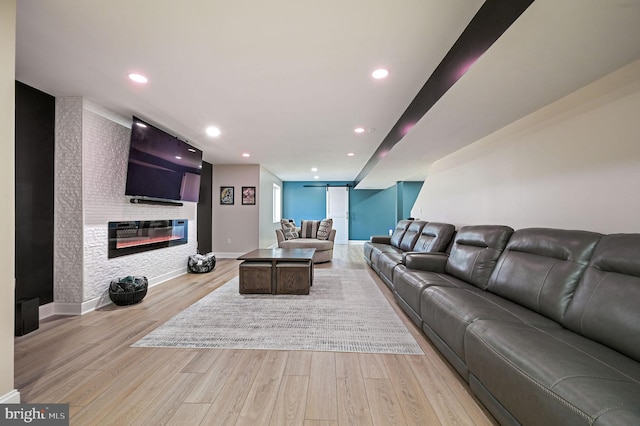 living room with light hardwood / wood-style flooring