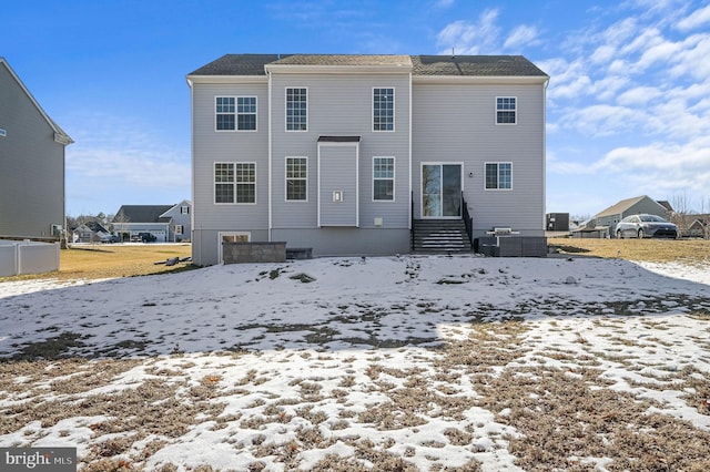 view of snow covered property