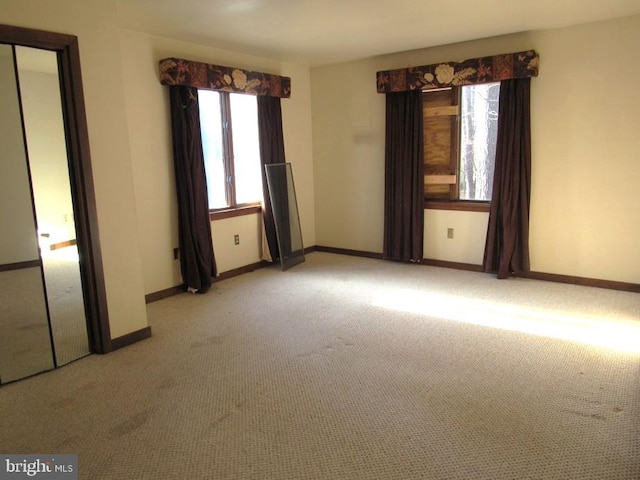 view of carpeted spare room