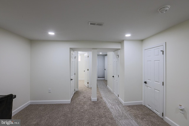 hallway with carpet