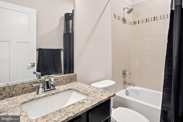 full bathroom featuring shower / bathtub combination with curtain, vanity, and toilet