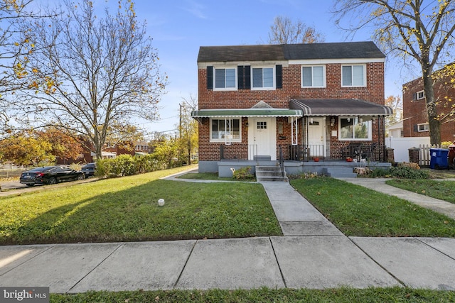 view of front facade with a front lawn