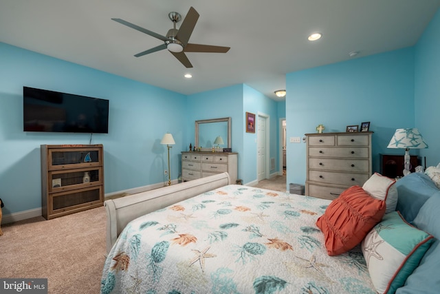 carpeted bedroom featuring ceiling fan