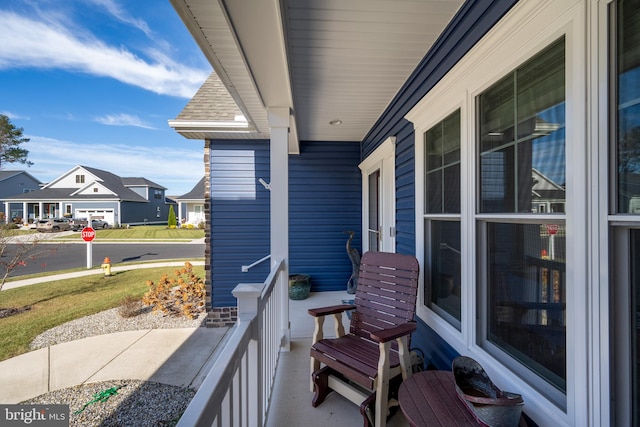 balcony featuring a porch