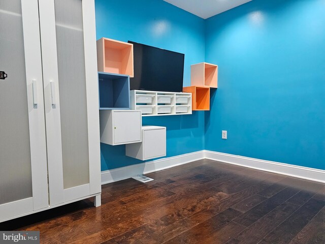 interior space featuring dark hardwood / wood-style flooring