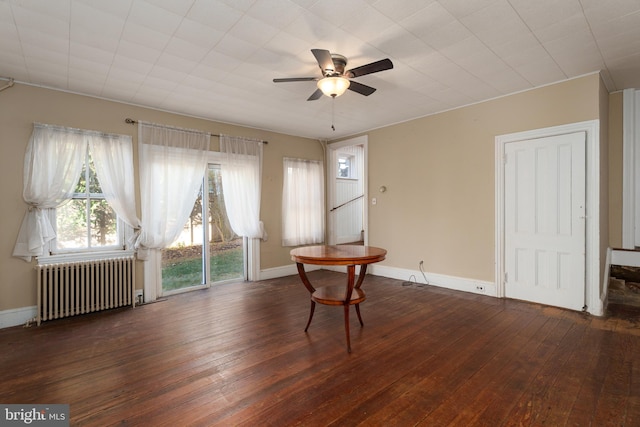 120 S Main St, Pennington, NJ 08534 - empty room with radiator heating unit, hardwood / wood-style flooring, ceiling fan, and baseboards