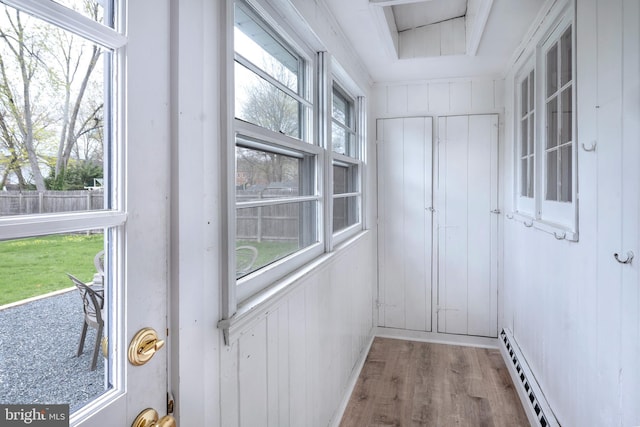120 S Main St, Pennington, NJ 08534 - doorway with baseboard heating and wood finished floors