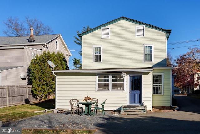 rear view of house with a patio area