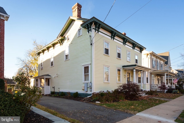 view of home's exterior featuring a porch