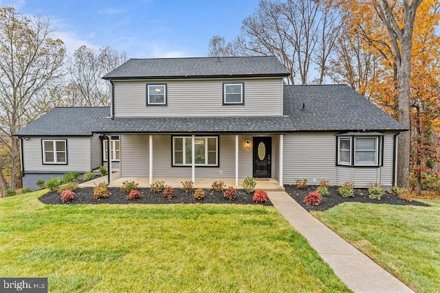 front facade with a front yard