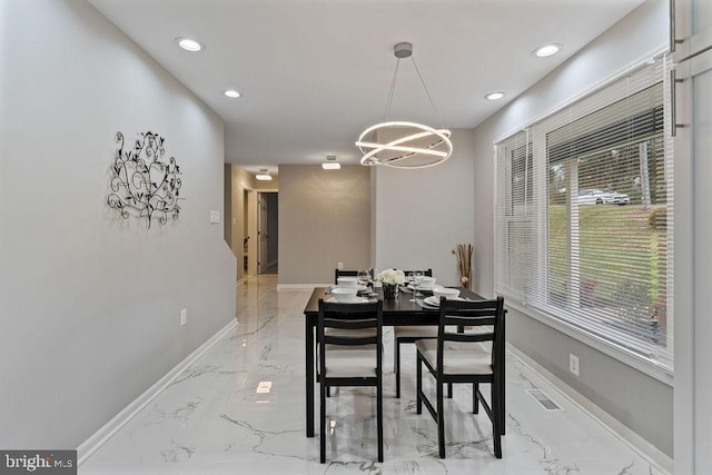 dining room with an inviting chandelier