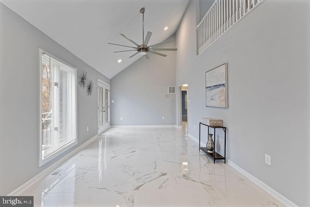 living room featuring high vaulted ceiling, a wealth of natural light, and ceiling fan