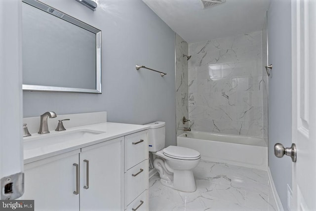 full bathroom featuring vanity, toilet, and tiled shower / bath combo