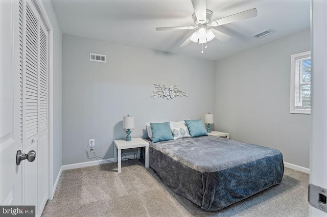 carpeted bedroom featuring ceiling fan