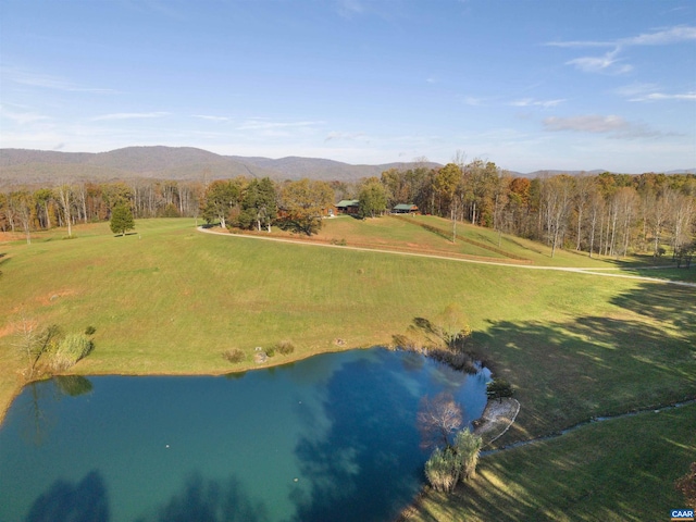 bird's eye view with a water and mountain view