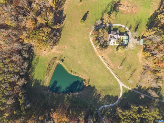 drone / aerial view featuring a water view and a rural view