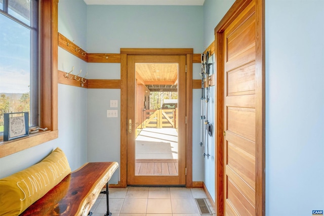 entryway featuring light tile patterned floors