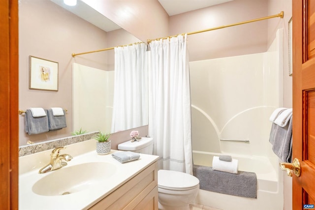 full bathroom featuring toilet, vanity, and shower / tub combo with curtain