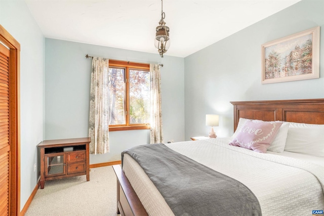 bedroom with light carpet