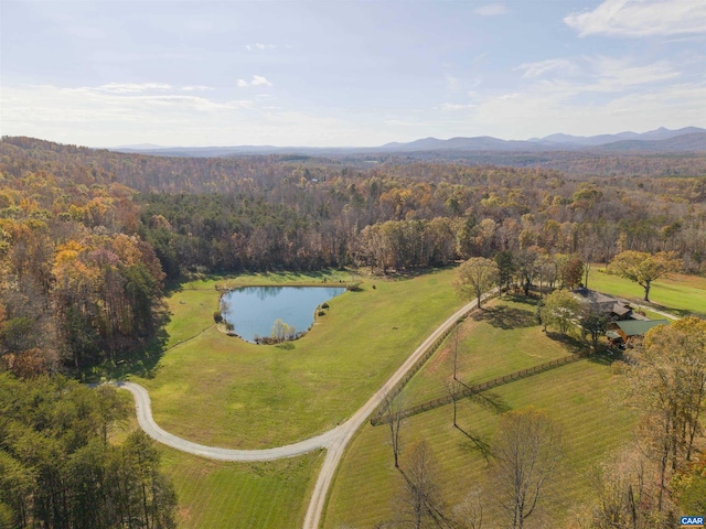 aerial view featuring a water and mountain view