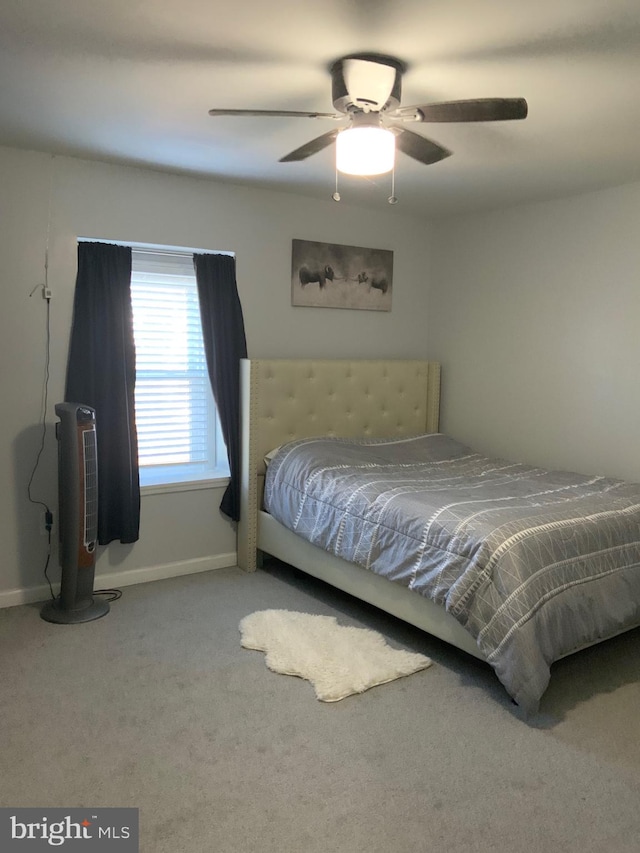 bedroom with carpet and ceiling fan