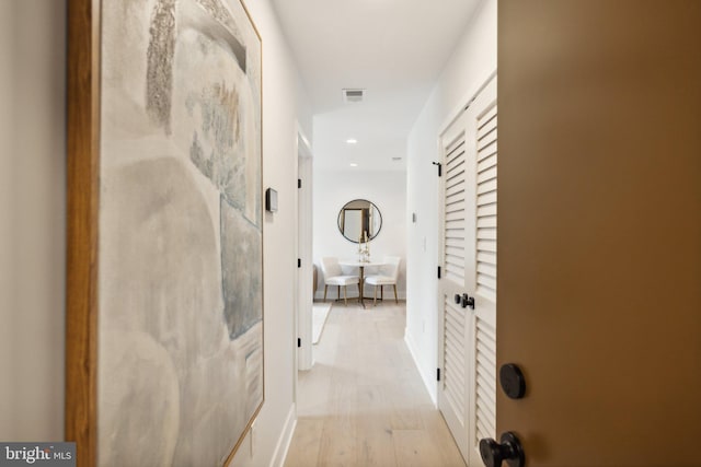 hallway featuring light hardwood / wood-style flooring