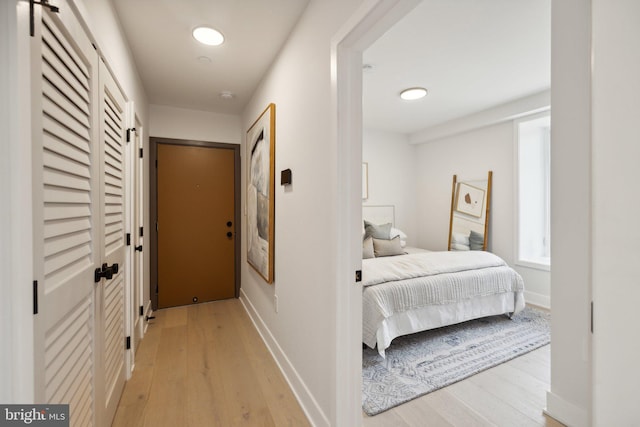 bedroom with light hardwood / wood-style floors