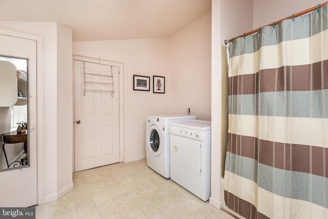 laundry area featuring washer and clothes dryer