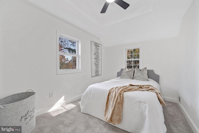 carpeted bedroom featuring ceiling fan and lofted ceiling