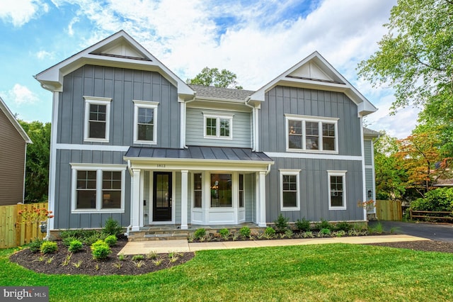 view of front of home with a front lawn