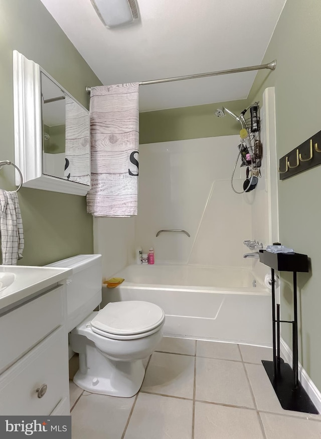 full bathroom with tile patterned floors, vanity, shower / bathtub combination, and toilet