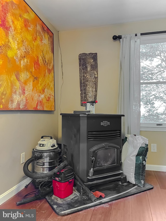 interior details featuring a wood stove