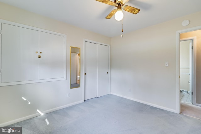 unfurnished bedroom with light carpet and ceiling fan