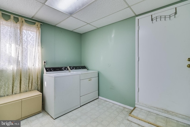 laundry area with independent washer and dryer