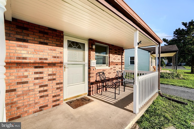 view of patio featuring a porch