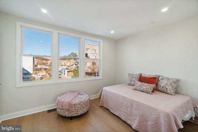 bedroom featuring wood-type flooring