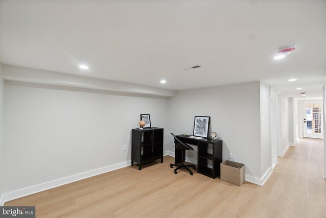 home office with light wood-type flooring