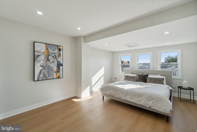 bedroom featuring light hardwood / wood-style floors