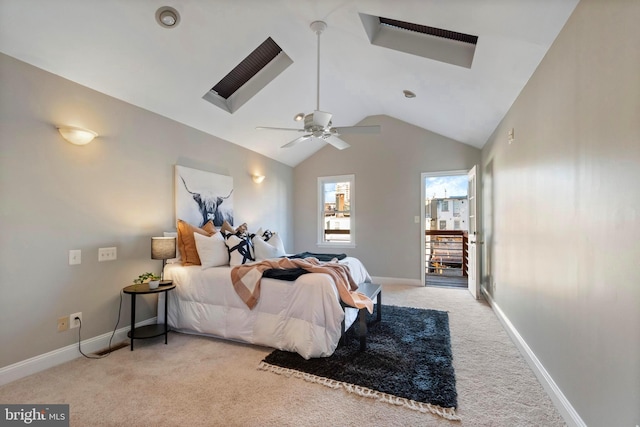 carpeted bedroom with access to outside, vaulted ceiling, and ceiling fan