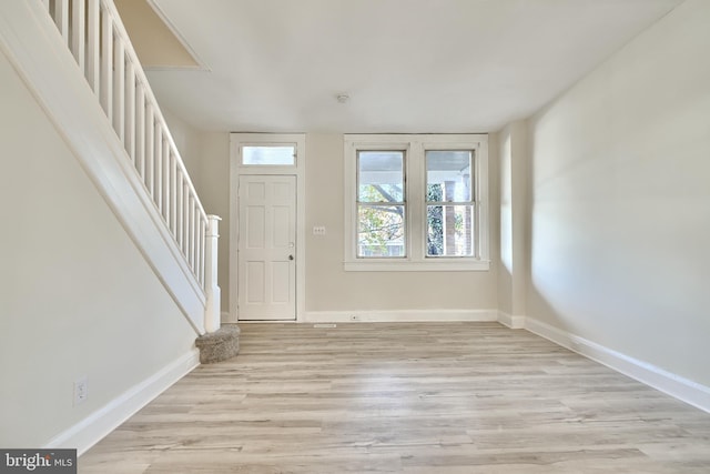 foyer entrance featuring light wood-type flooring