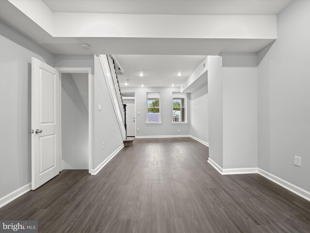 interior space with dark hardwood / wood-style floors