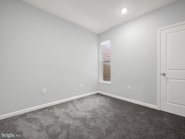 view of carpeted spare room