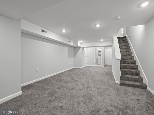 basement featuring carpet flooring