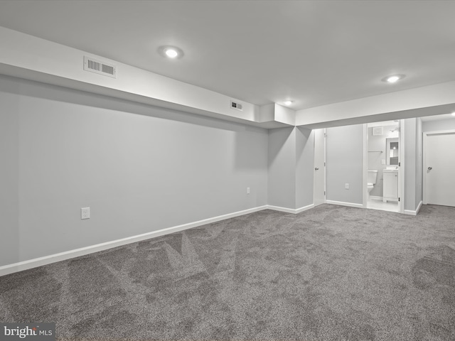 basement with carpet flooring