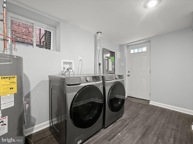 laundry area featuring independent washer and dryer, dark hardwood / wood-style flooring, electric panel, and water heater