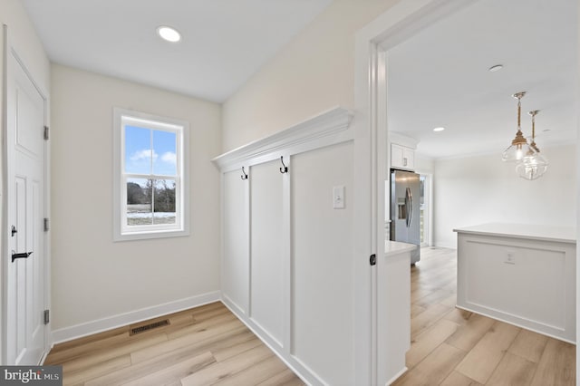 mudroom featuring light hardwood / wood-style flooring