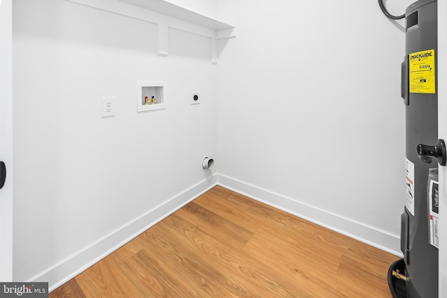 laundry room featuring washer hookup, hardwood / wood-style flooring, electric water heater, and electric dryer hookup